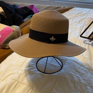 Chic Tan Wide-Brim Hat with Black Band